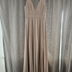 Size 10 Beige bridesmaid dress with a left leg slit. In really great condition w